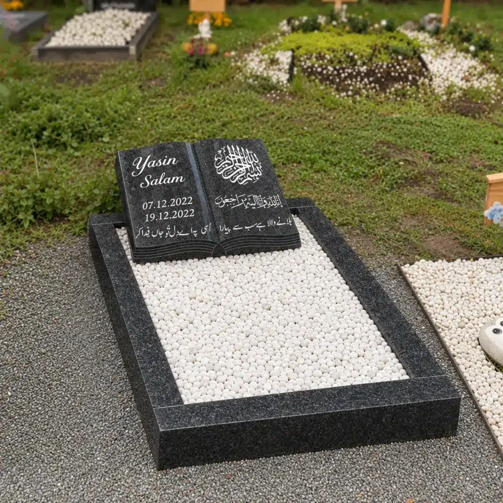 Kindergrabstein Modell Kitab aus Nero Impala Granit auf dem Friedhof